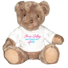 Load image into Gallery viewer, Janey Godley Not Dead Yet Tour Teddy Bear with Logo T-Shirt

